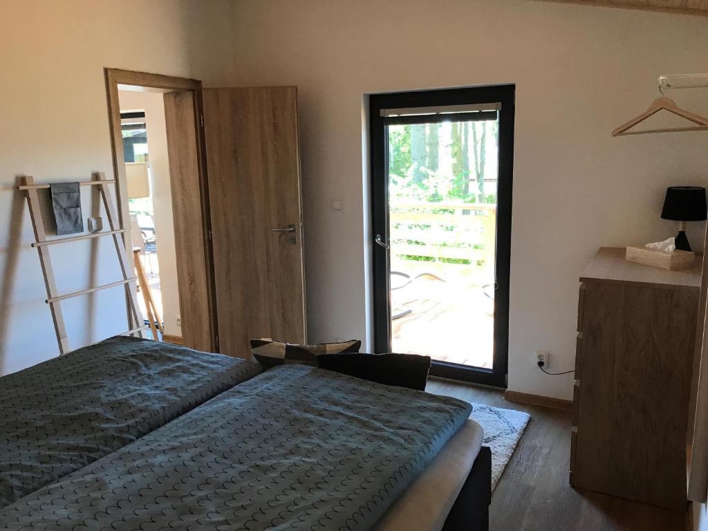 Een bed of bedden in een kamer bij Chata Bellis