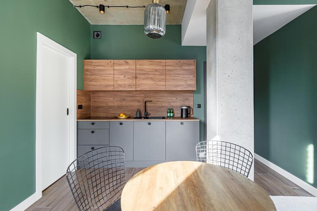 Kuchyňa alebo kuchynka v ubytovaní Homewell Boutique Apartments Stare Miasto