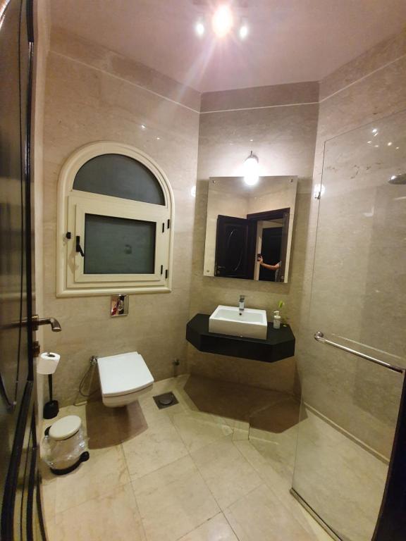Ванная комната в Sunny Studios in New Cairo