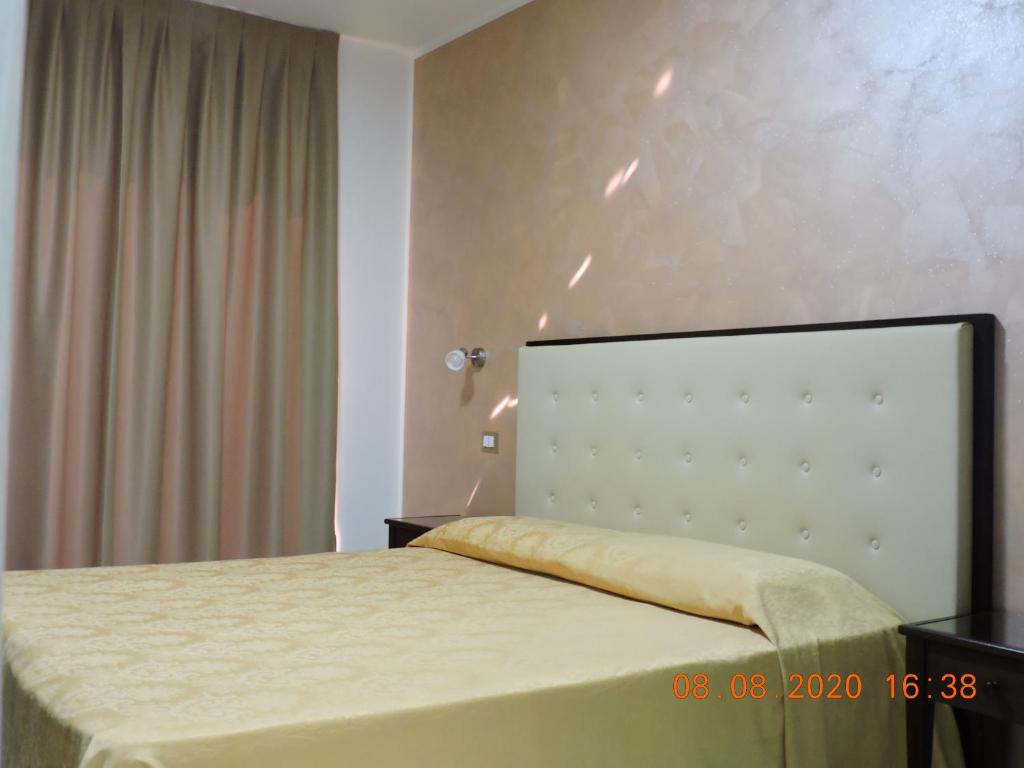 Postel nebo postele na pokoji v ubytování B&B Aquila Reale