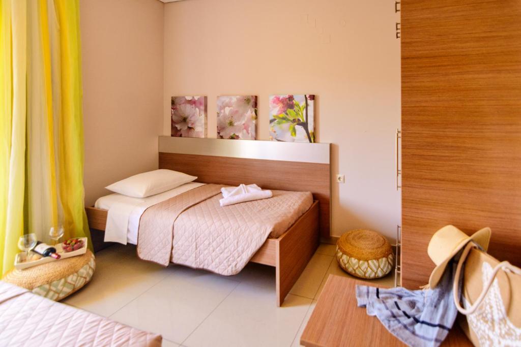 Posteľ alebo postele v izbe v ubytovaní Relax Hotel
