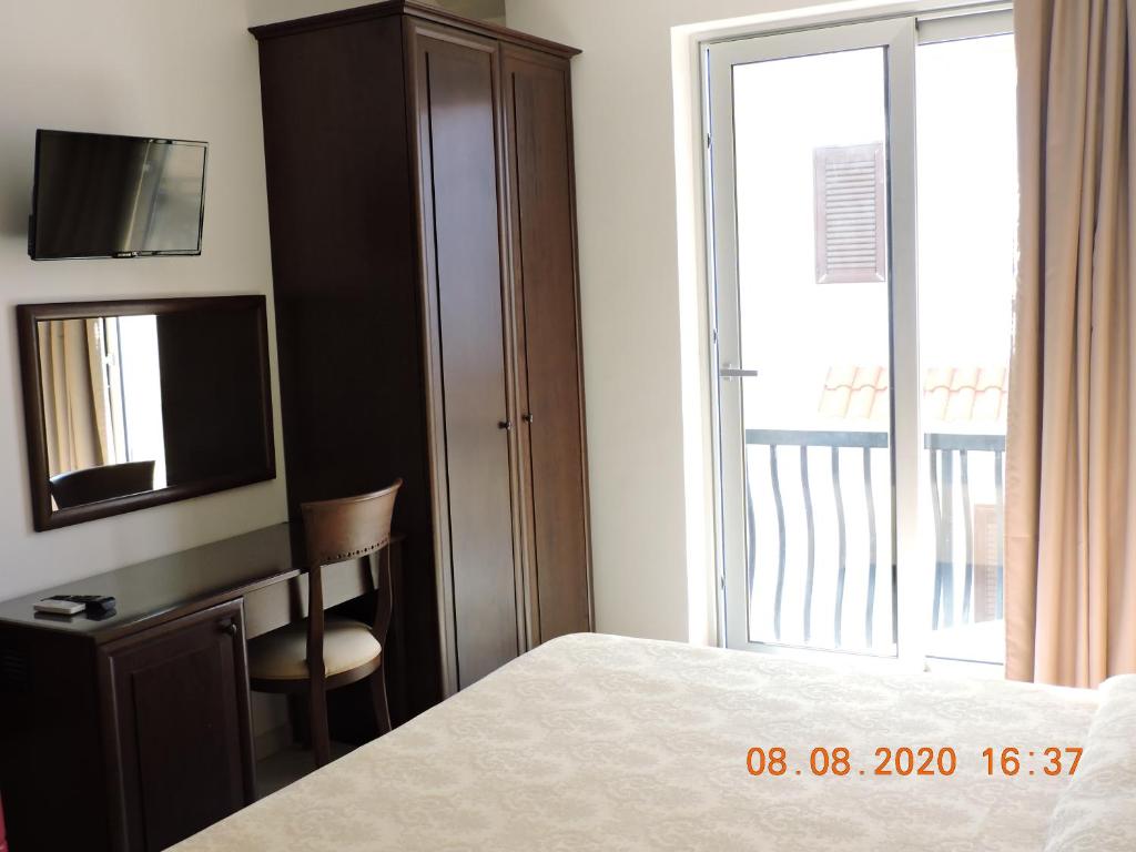 Postel nebo postele na pokoji v ubytování B&B Aquila Reale