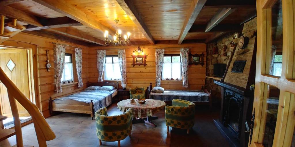 Postel nebo postele na pokoji v ubytování Stary Spichlerz nad Wartą