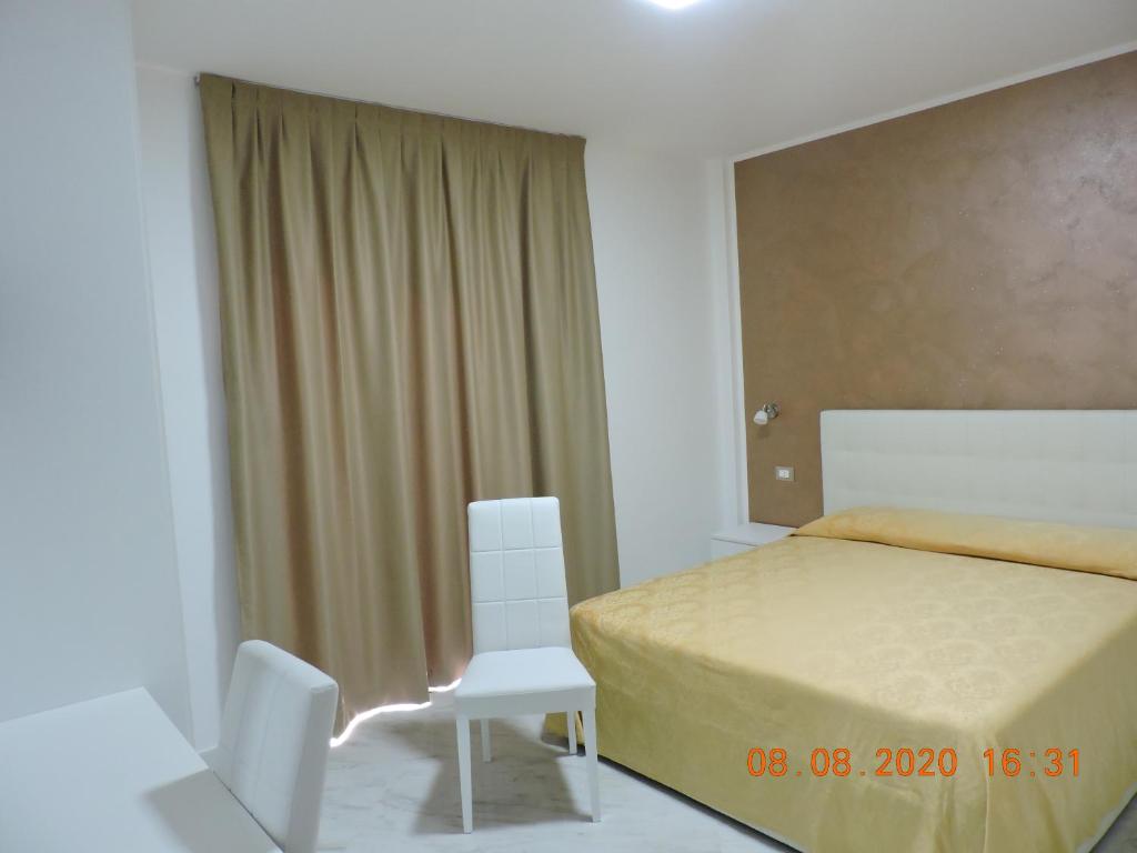 Postel nebo postele na pokoji v ubytování B&B Aquila Reale