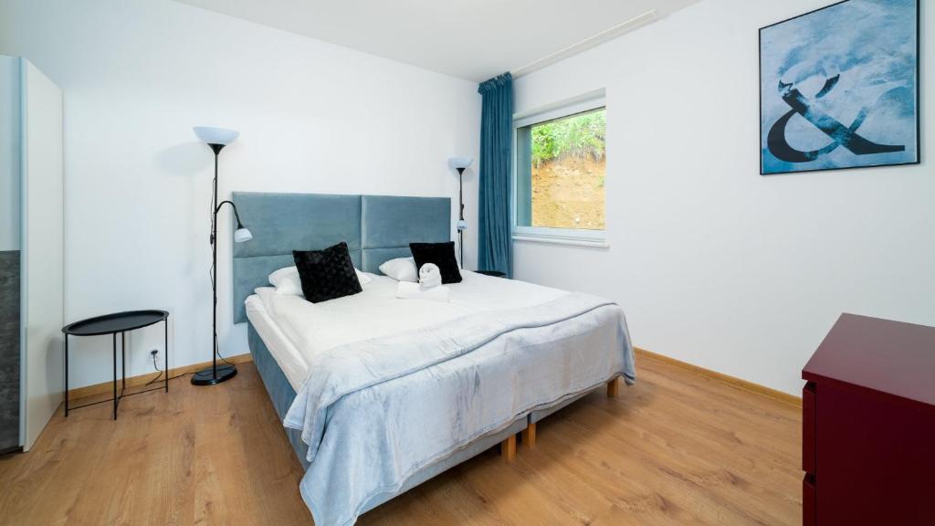 Posteľ alebo postele v izbe v ubytovaní Apartamenty EverySky - Wyspiańskiego 4