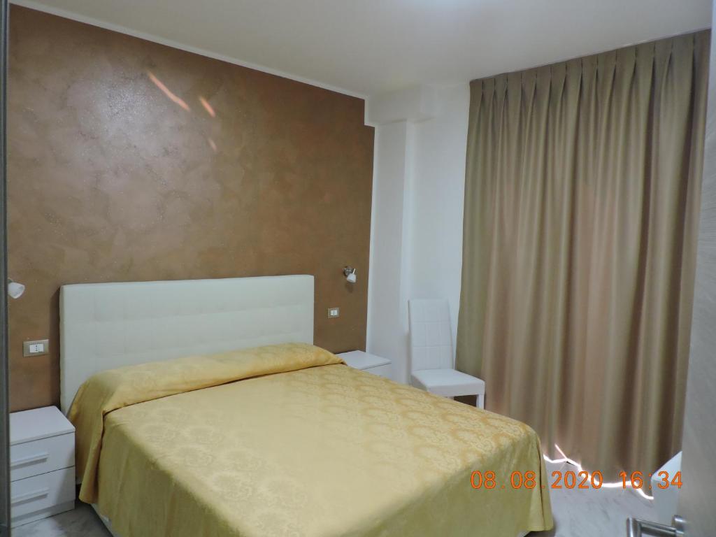 Postel nebo postele na pokoji v ubytování B&B Aquila Reale