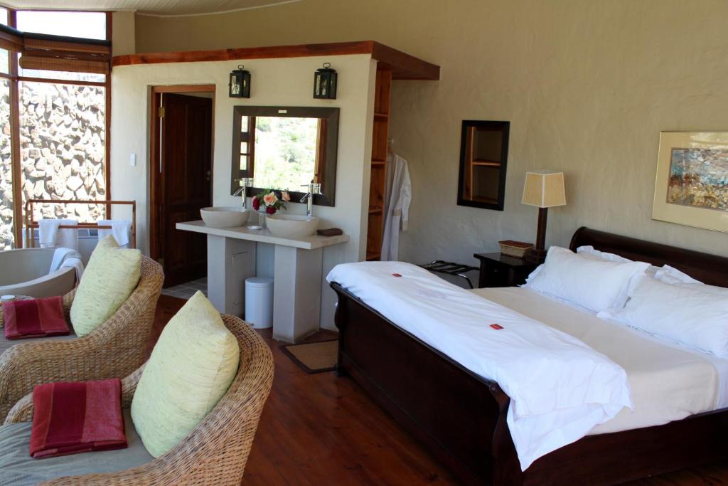 Postel nebo postele na pokoji v ubytování Sederkloof Lodge