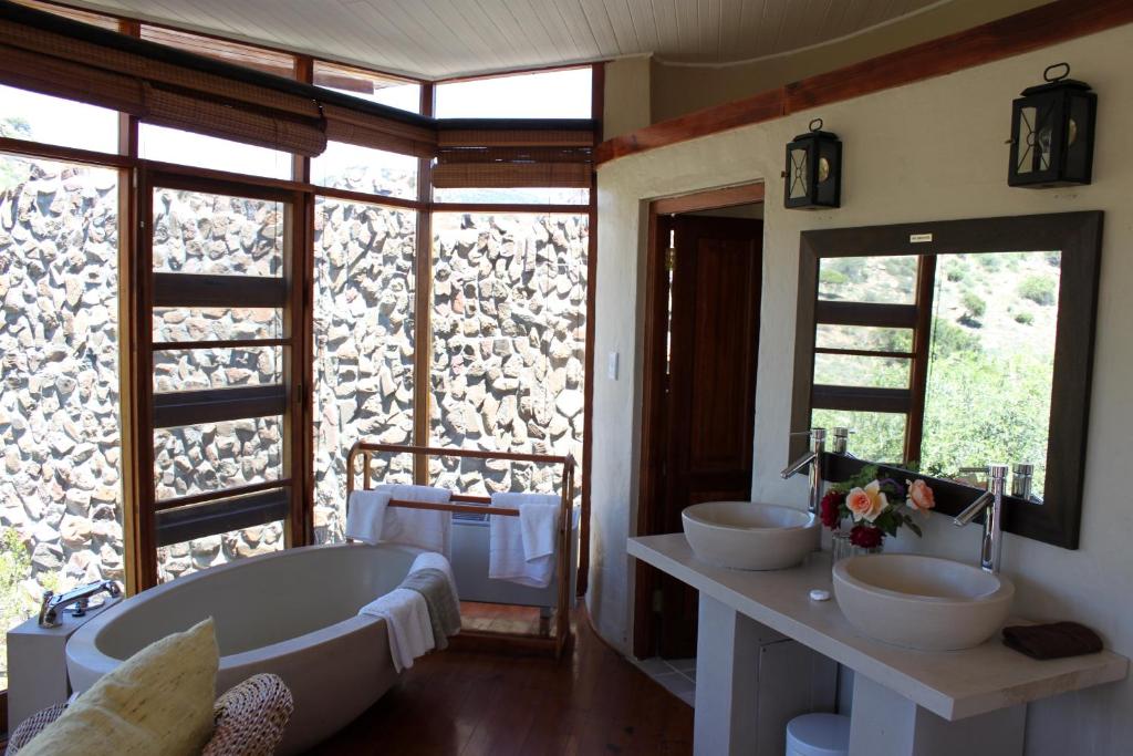 Postel nebo postele na pokoji v ubytování Sederkloof Lodge