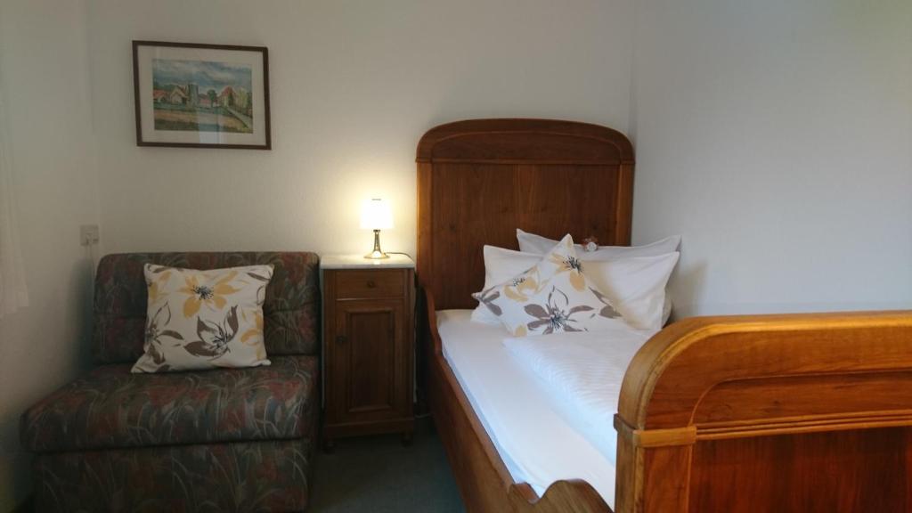 מיטה או מיטות בחדר ב-Pension Landhaus Fischer