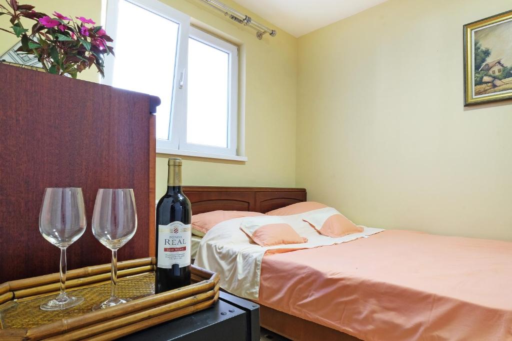 Postel nebo postele na pokoji v ubytování Villa Tower Gardos