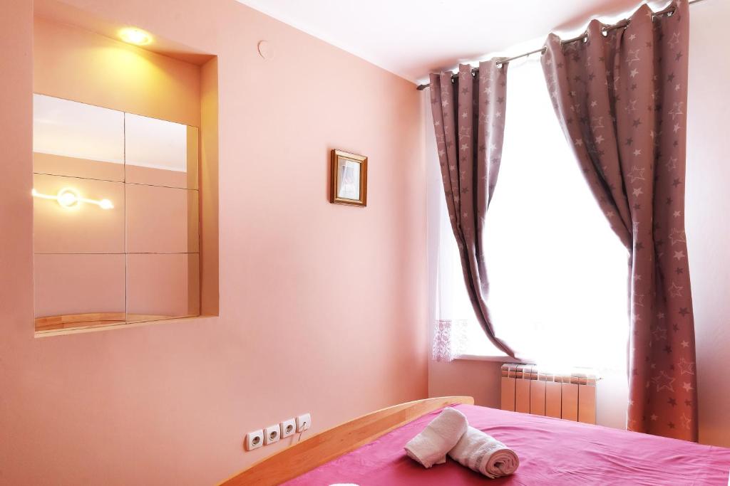 Postel nebo postele na pokoji v ubytování Villa Tower Gardos