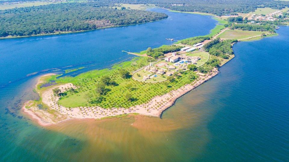 an aerial view of an island in the water at Resort da Ilha in Sales
