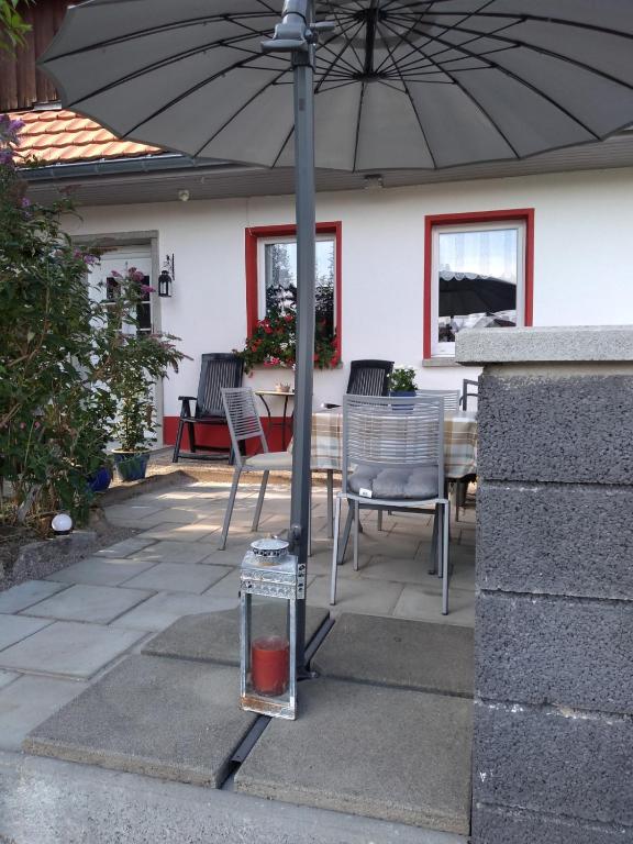Patio nebo venkovní prostory v ubytování Kim`s Cottage