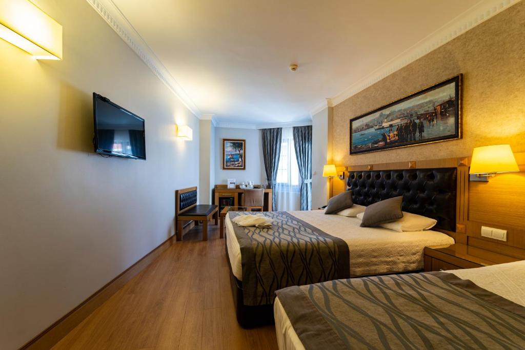 Postel nebo postele na pokoji v ubytování Levent Hotel Istanbul