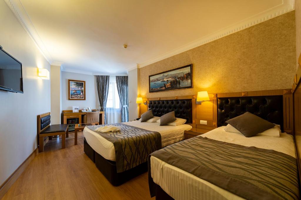 Postel nebo postele na pokoji v ubytování Levent Hotel Istanbul
