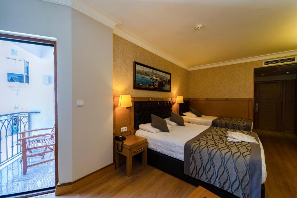 Postel nebo postele na pokoji v ubytování Levent Hotel Istanbul