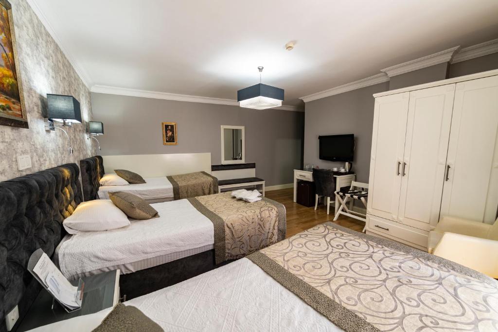Postel nebo postele na pokoji v ubytování Levent Hotel Istanbul