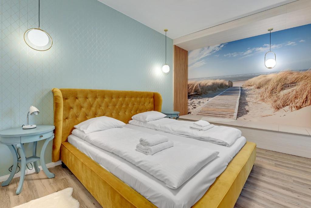 Posteľ alebo postele v izbe v ubytovaní Granaria Comfort Apartments