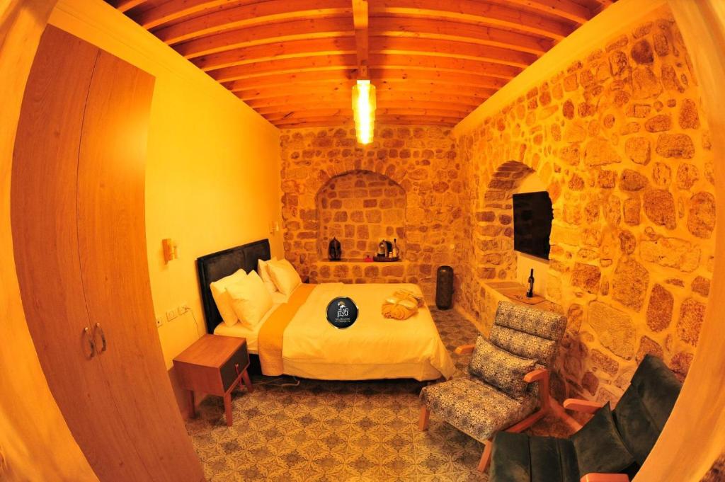 Postel nebo postele na pokoji v ubytování Salah Aldin House