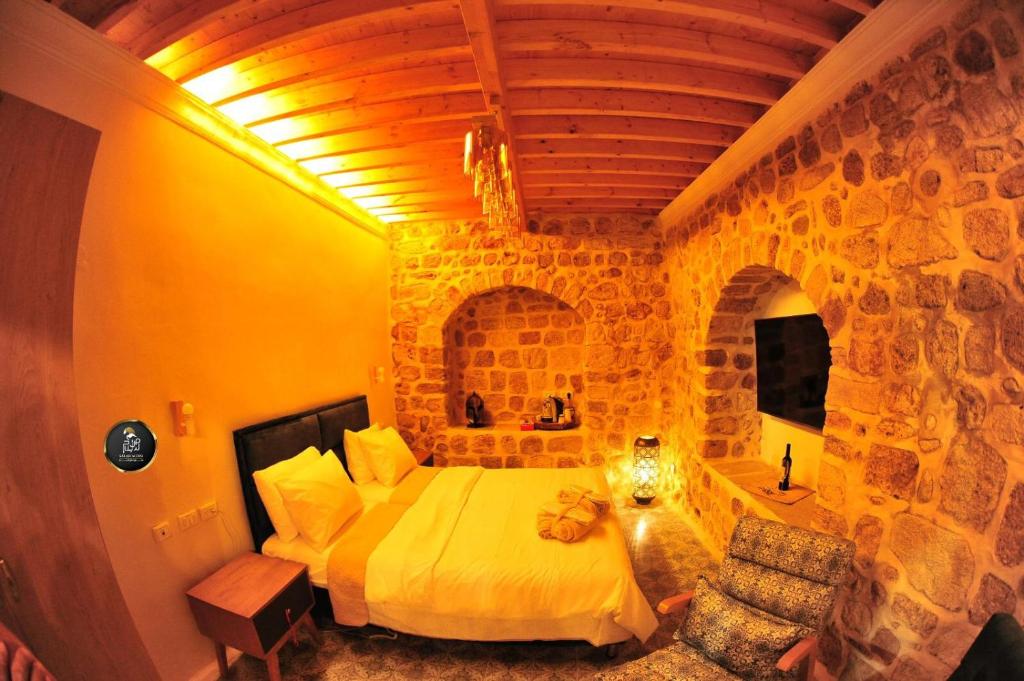 Postel nebo postele na pokoji v ubytování Salah Aldin House