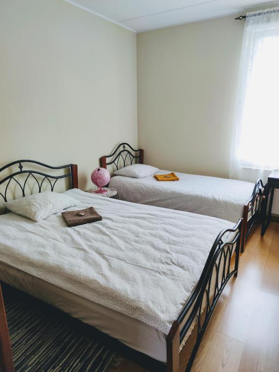 Postel nebo postele na pokoji v ubytování Maria Rooms