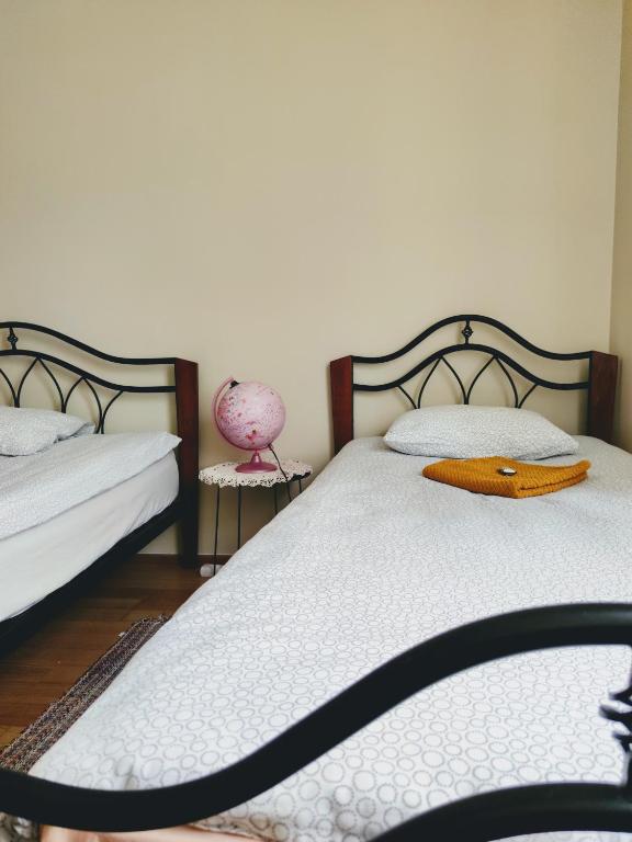 Postel nebo postele na pokoji v ubytování Maria Rooms