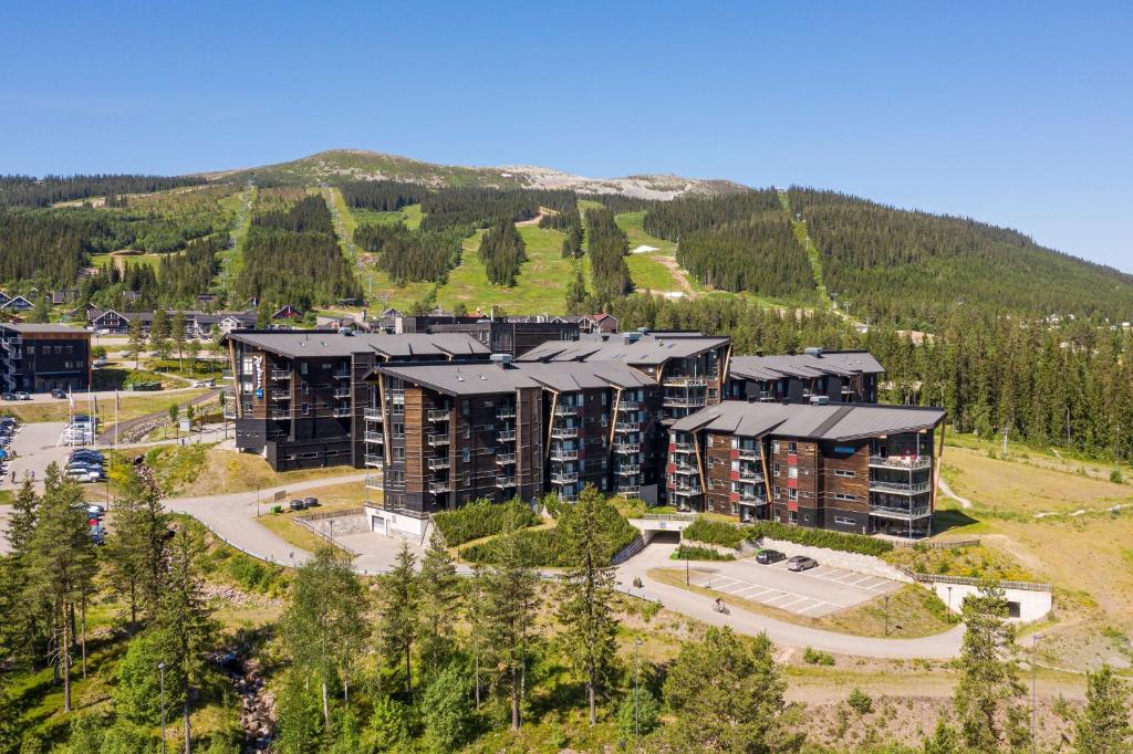 an aerial view of an apartment complex with a mountain at Radisson Blu Resort, Trysil in Trysil
