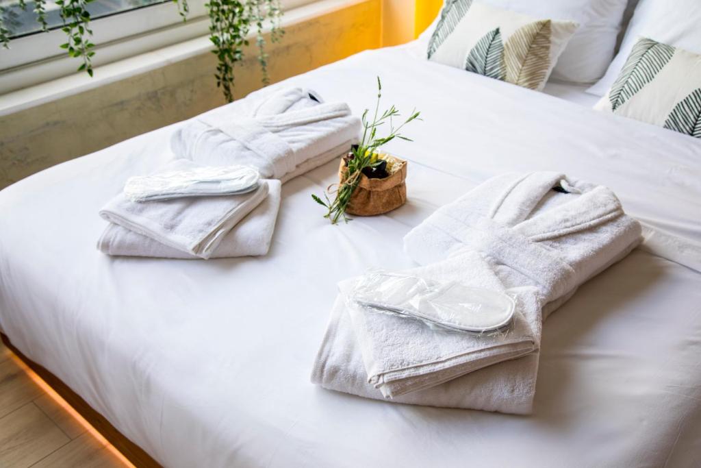 Posteľ alebo postele v izbe v ubytovaní Eunoia - Beautiful Living in the Heart of Athens
