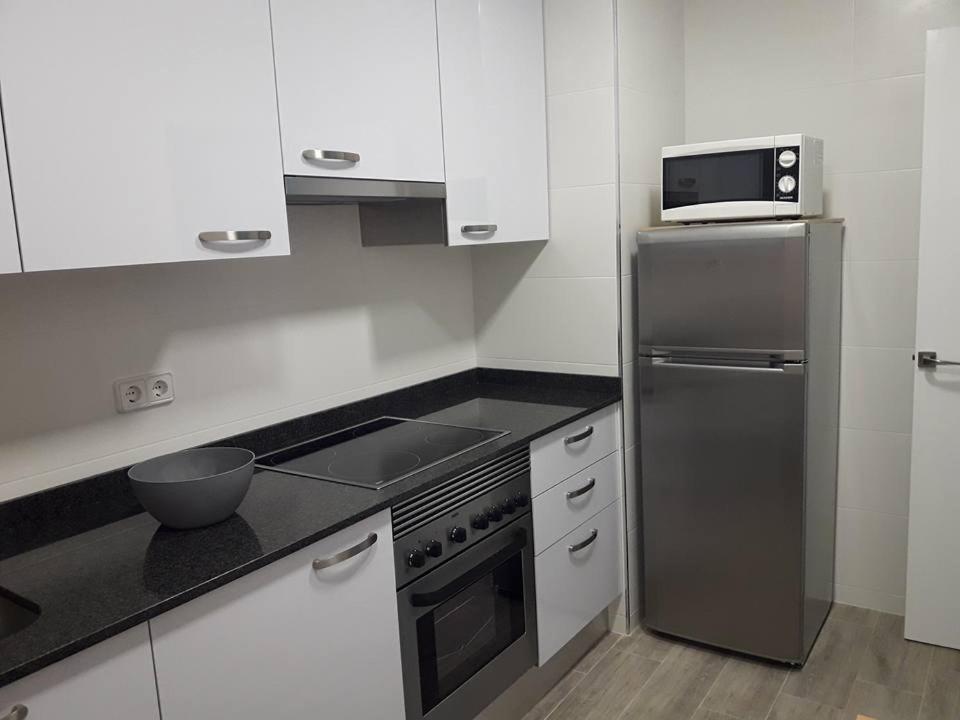 Kuchyň nebo kuchyňský kout v ubytování Apartamento Nuria Plaza San Isidro