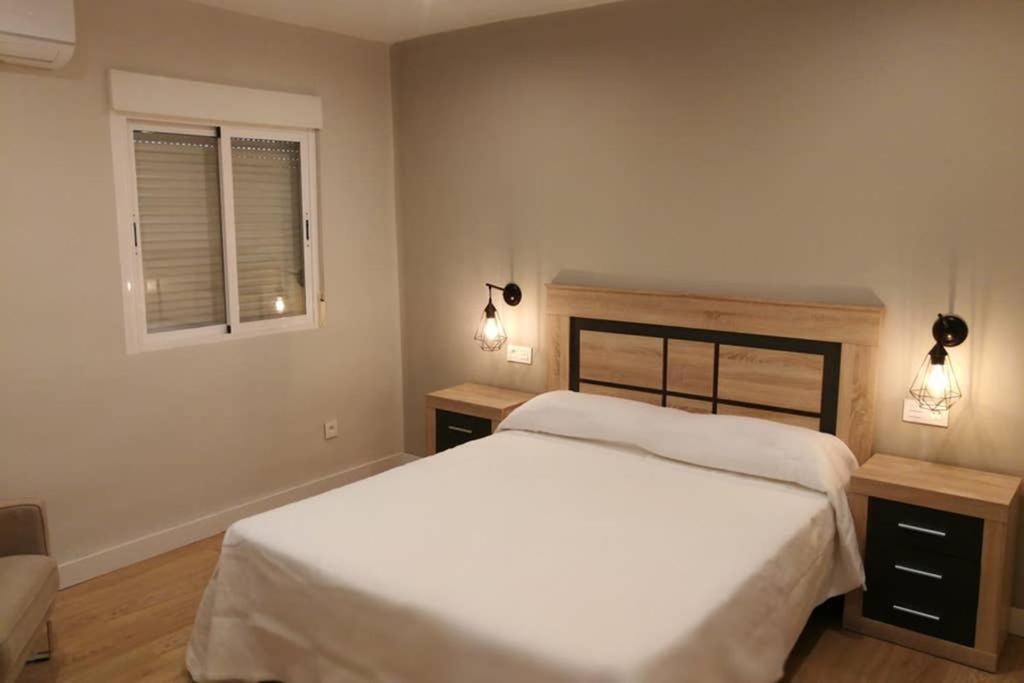 Llit o llits en una habitació de STAY TOLETVM Apartametos turísticos
