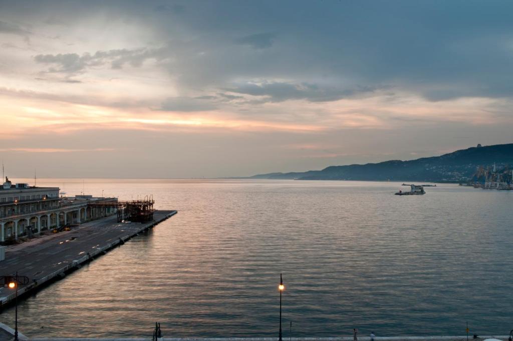 a view of a large body of water with a pier at Savoia Excelsior Palace Trieste - Starhotels Collezione in Trieste