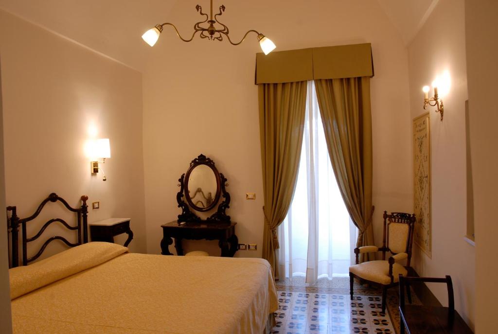 Postel nebo postele na pokoji v ubytování Masseria Salamina