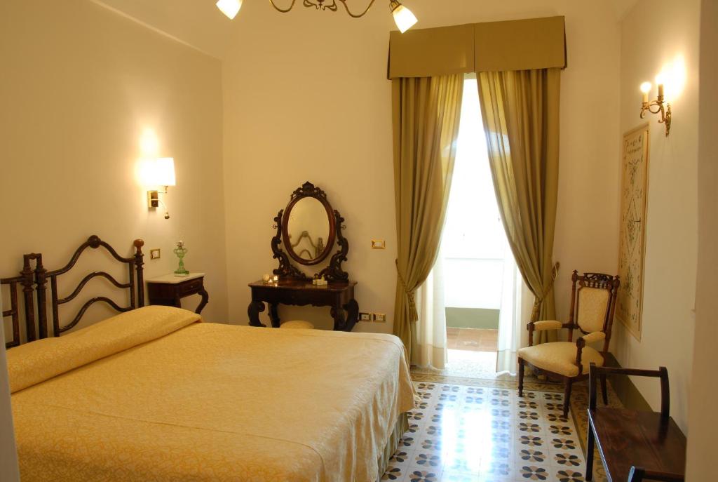 Postel nebo postele na pokoji v ubytování Masseria Salamina