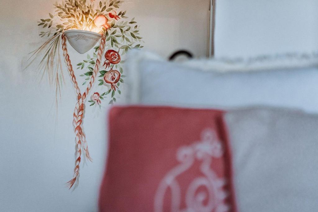 Postel nebo postele na pokoji v ubytování Hotel Pulicinu