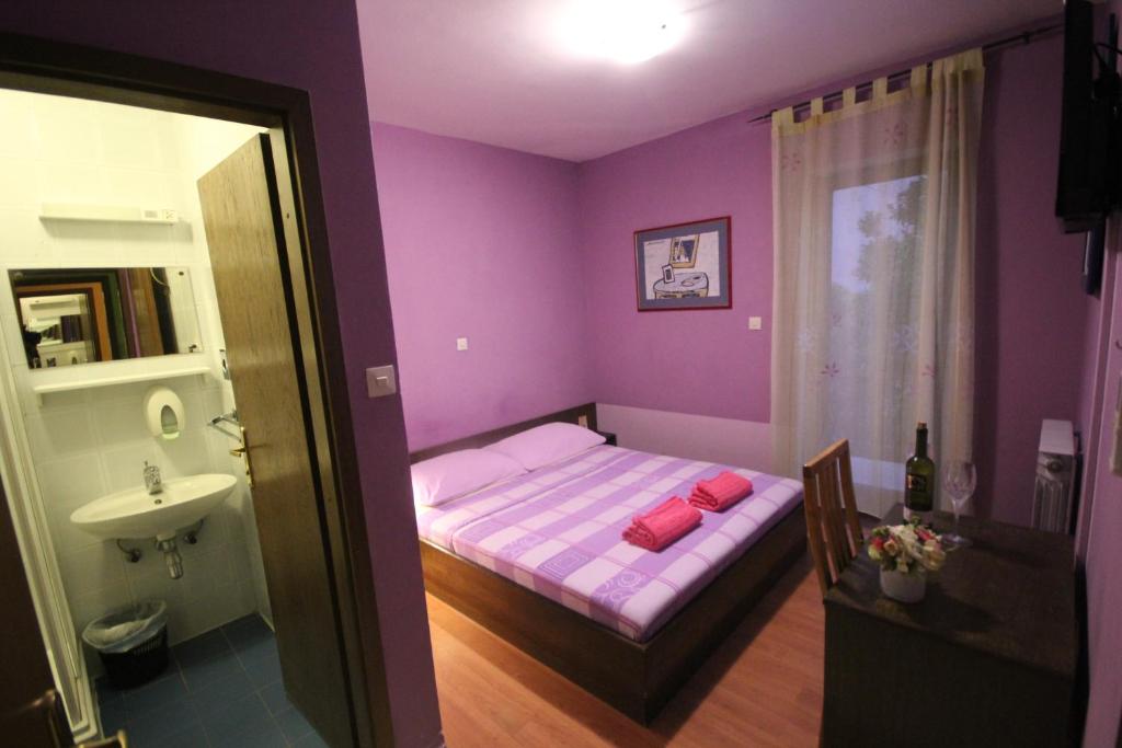 Posteľ alebo postele v izbe v ubytovaní Guest House Vila Micika Dubrovnik