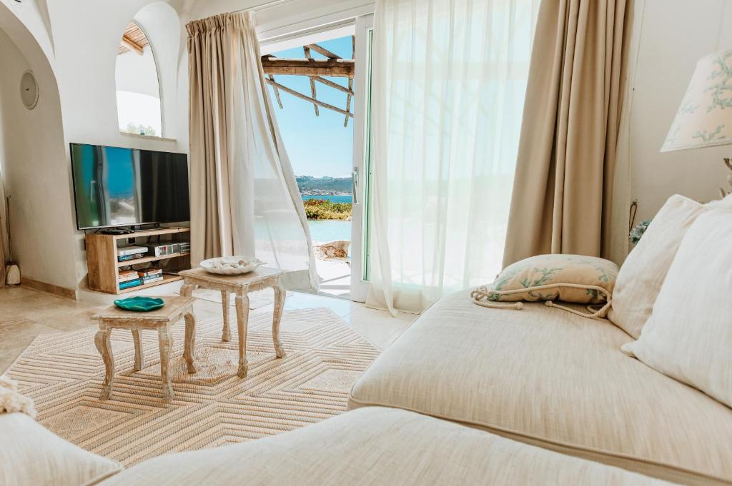 TV a/nebo společenská místnost v ubytování Hotel Pulicinu