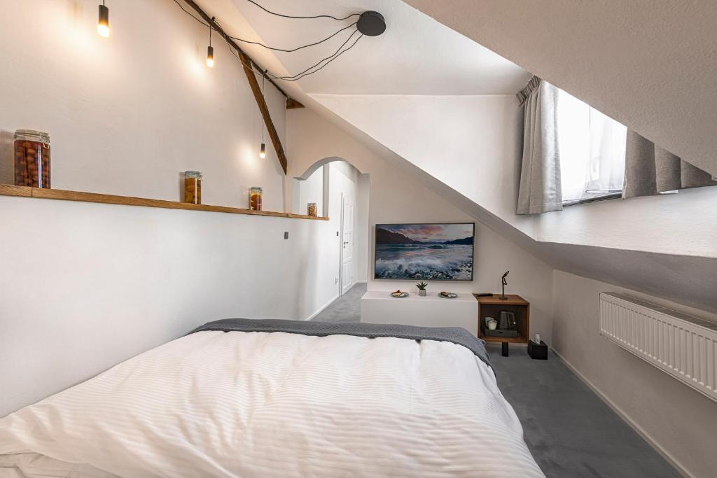 Postel nebo postele na pokoji v ubytování Boutique hotel & spa DOMA u nás - entry AquaCity free