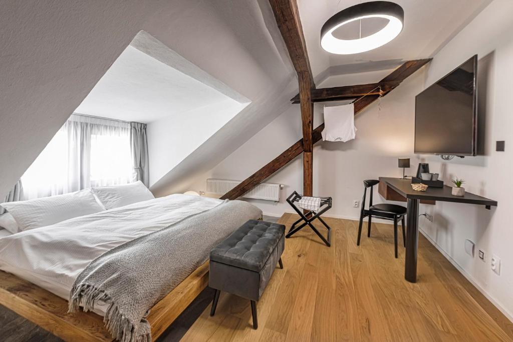 Postel nebo postele na pokoji v ubytování Boutique hotel & spa DOMA u nás - entry AquaCity free