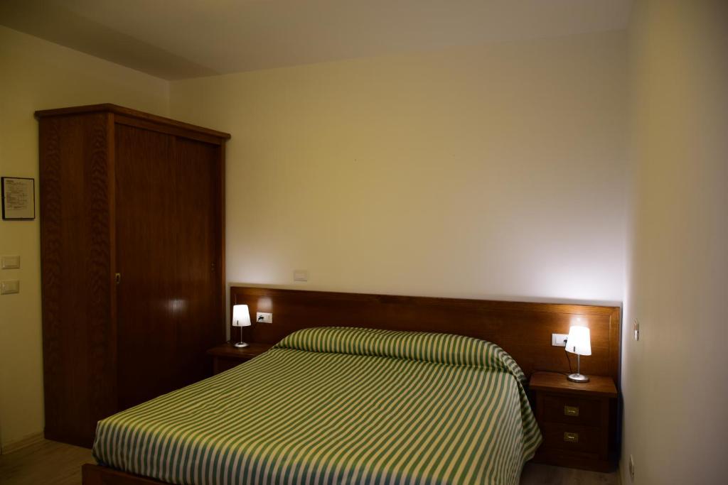 Postel nebo postele na pokoji v ubytování Park Hotel Elefante