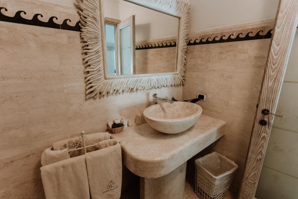 Koupelna v ubytování Hotel Pulicinu