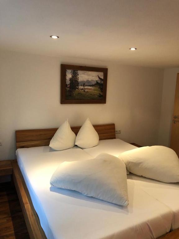 Postel nebo postele na pokoji v ubytování Haus Oberdorf