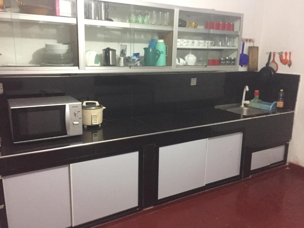 Kuchyň nebo kuchyňský kout v ubytování Olivia HomeStay