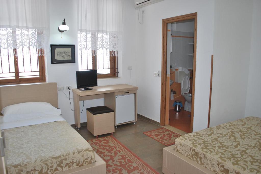 Llit o llits en una habitació de Hotel Boutique Osumi