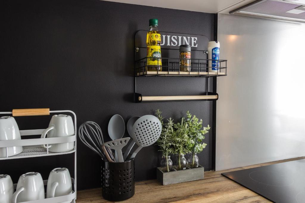 Nápoje v ubytování Appartement La Madeleine