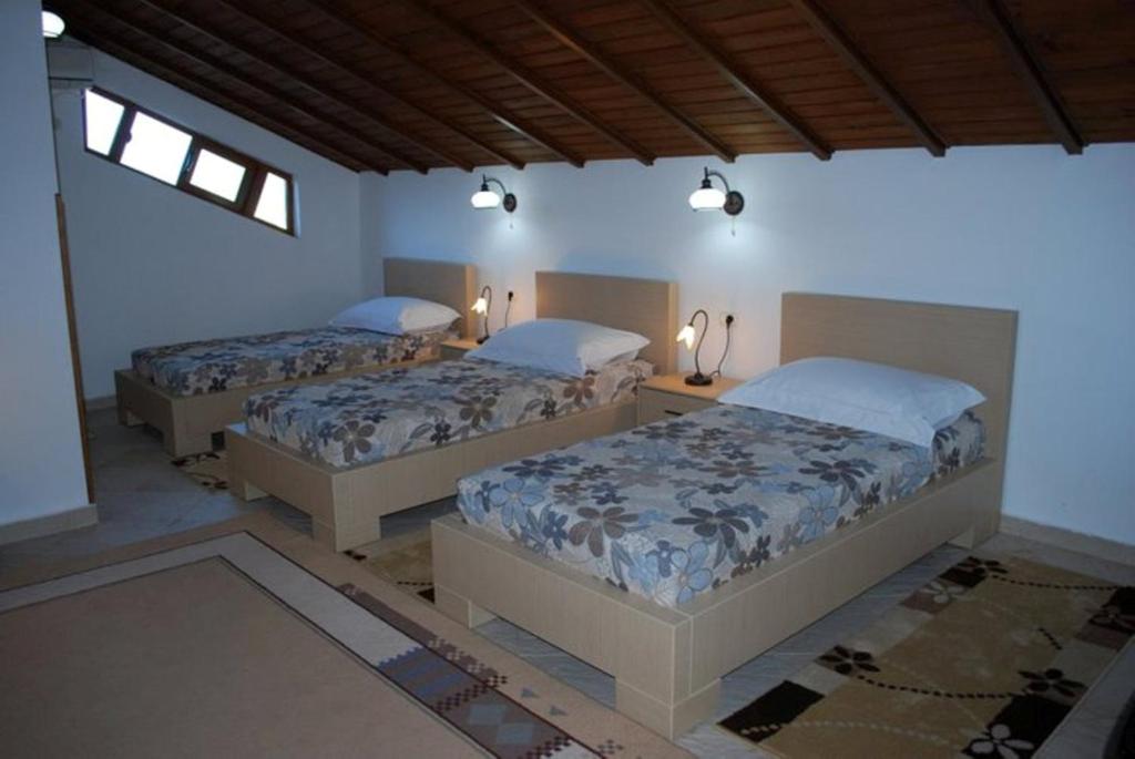 Llit o llits en una habitació de Hotel Boutique Osumi