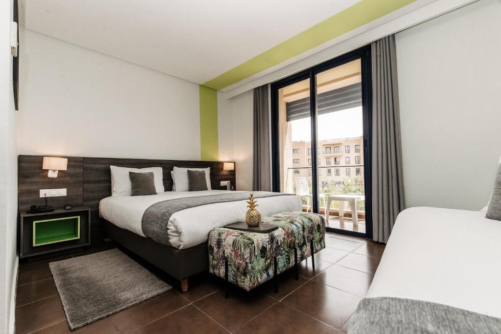 Wazo Hotel - Triple Room