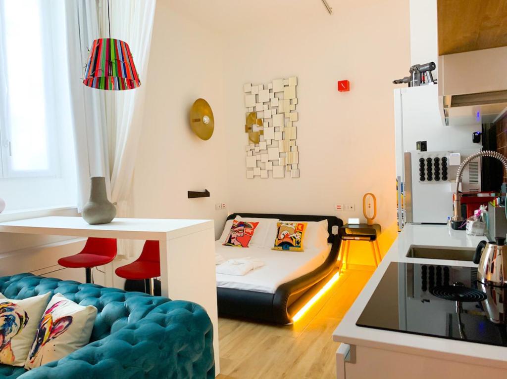 Postel nebo postele na pokoji v ubytování HomeSuite sul Lago