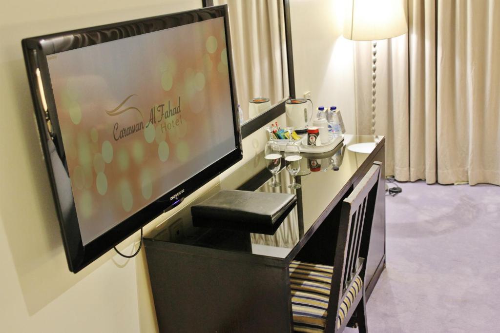 TV a/nebo společenská místnost v ubytování Carawan Al Fahad Hotel