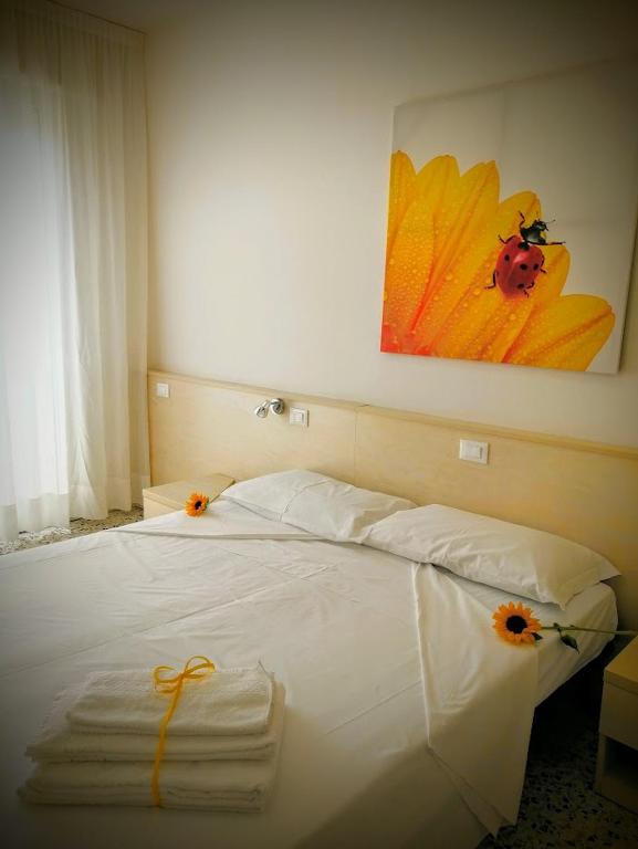 Posteľ alebo postele v izbe v ubytovaní Hotel Souvenir