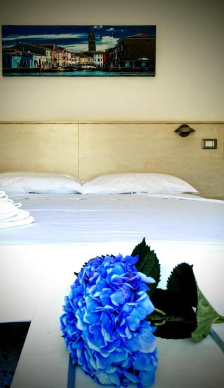 Posteľ alebo postele v izbe v ubytovaní Hotel Souvenir